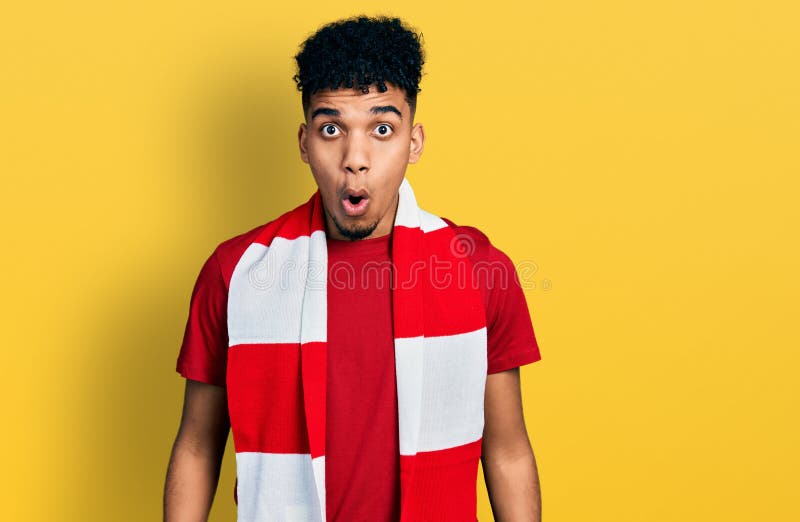 Young African American Man Football Hooligan Cheering Game Scared and ...