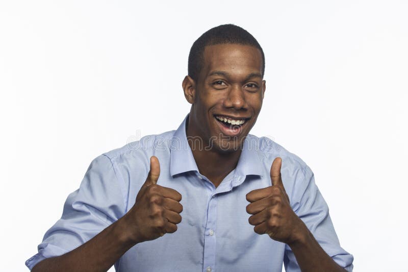 Young African American man giving thumbs up, horizontal