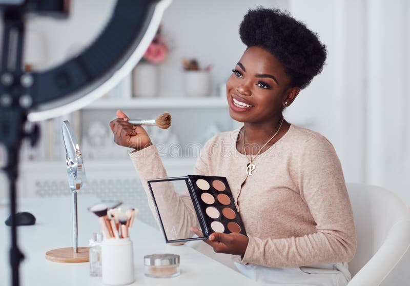 Happy Young African American Woman Streaming a Beauty Vlog from Home ...