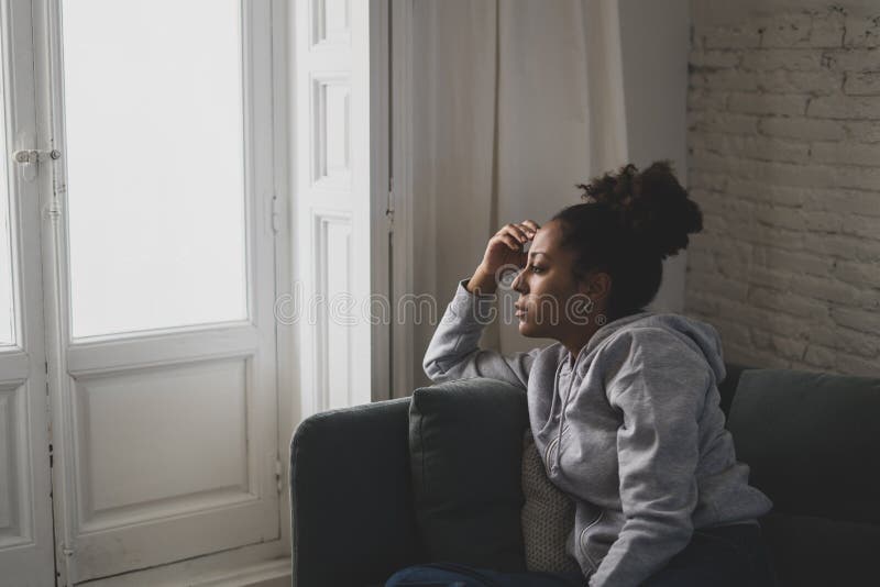 Young African American Woman Suffering from Depression, Anxiety and