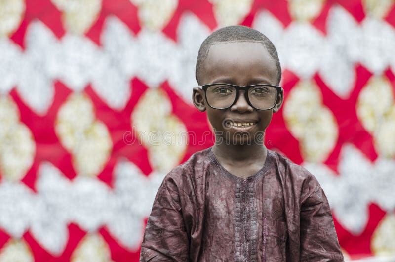 African Boy Wearing Fun Extra Large Sun Glasses Stock Photo