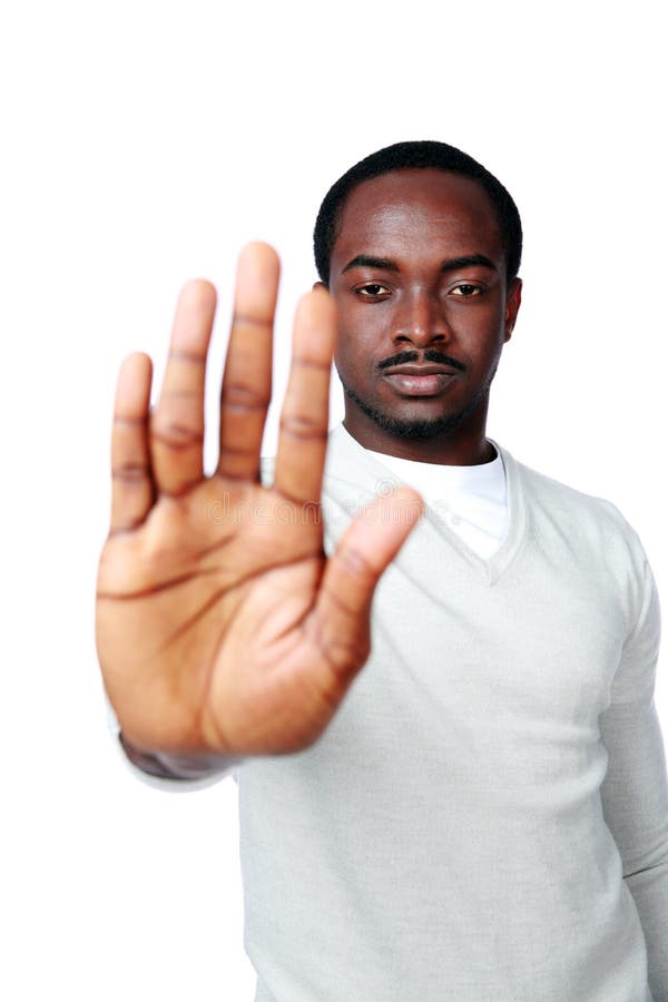 Young african man showing stop sign with hand royalty free stock images Young african man showing stop sign with hand royalty free stock images