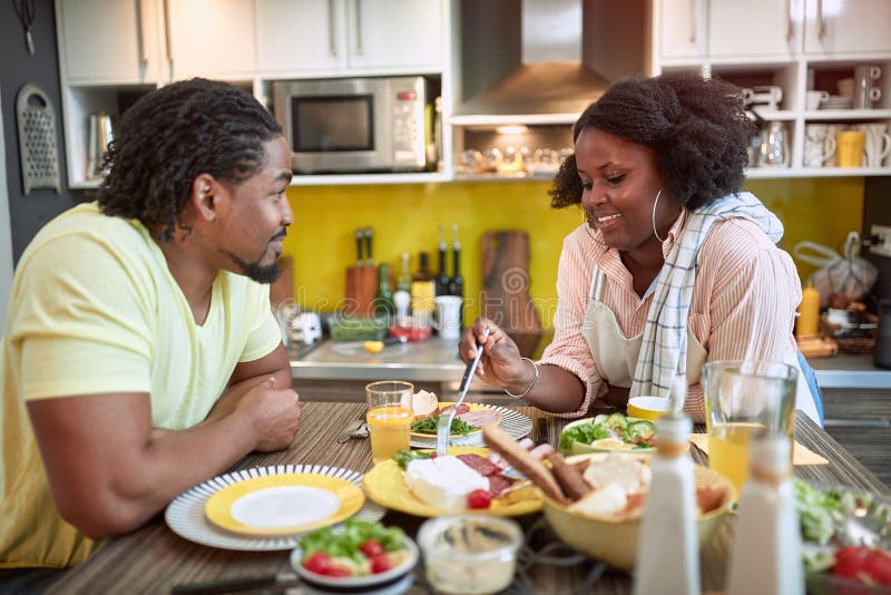 Young Afro American Couple Enjoying Breakfast Together Togetherness Joy Talk Sharing Meal 