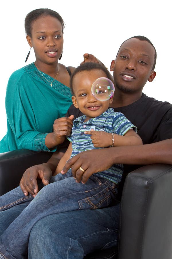 Young afro american family with bubbles