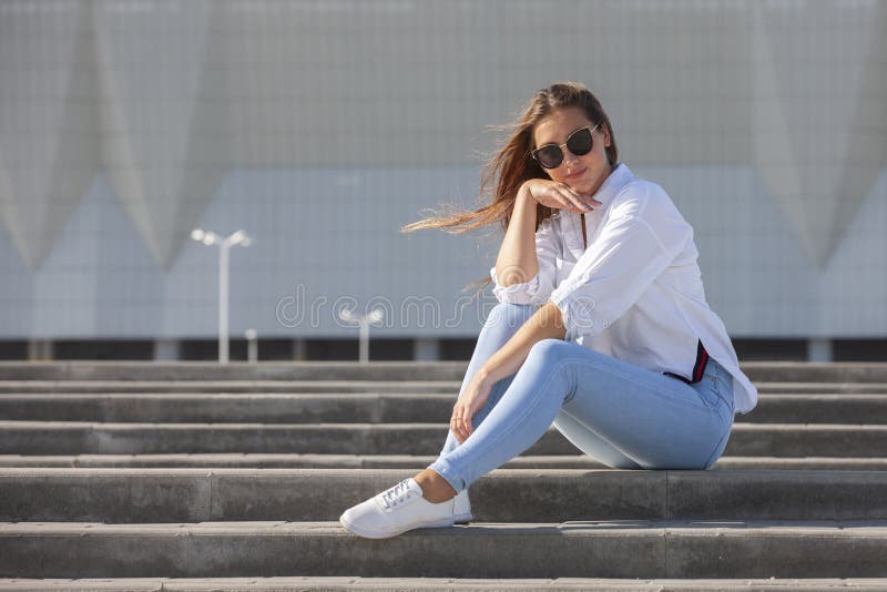 268 Girl Jeans Shirt Sitting Steps Stock Photos - Free & Royalty-Free Stock  Photos from Dreamstime
