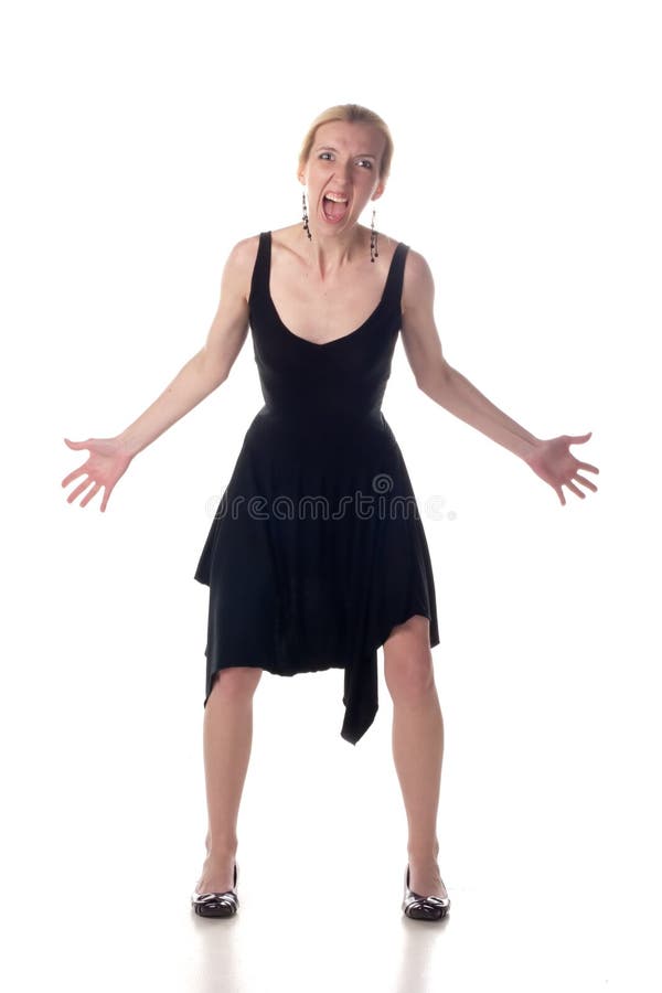 Young angered girl in a black dress