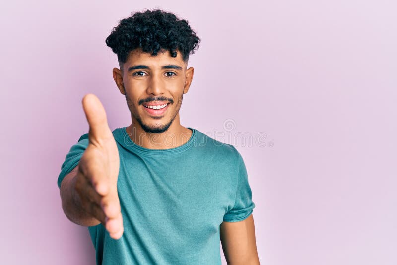 Young Arab Handsome Man Wearing Casual Clothes Smiling Friendly