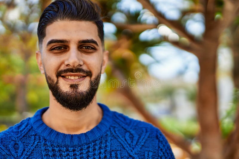 Young arab man smiling confident at park royalty free stock images