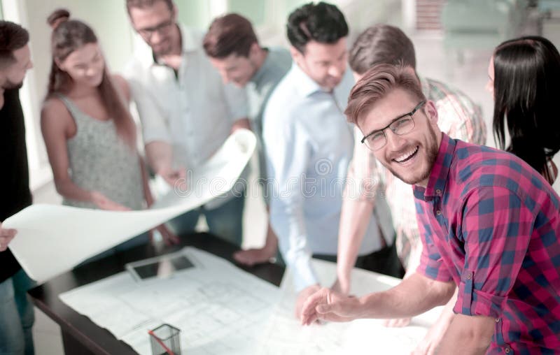Young architect on the background of the design Bureau royalty free stock images
