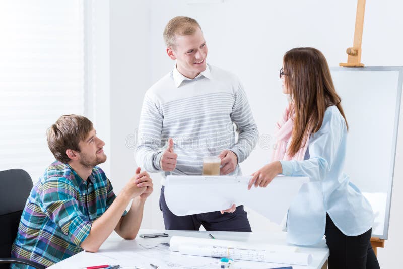 Young architectural team at work stock photos