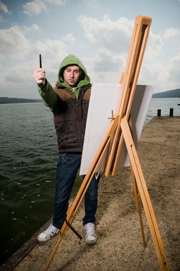 Young artist drawing outdoors royalty free stock photos