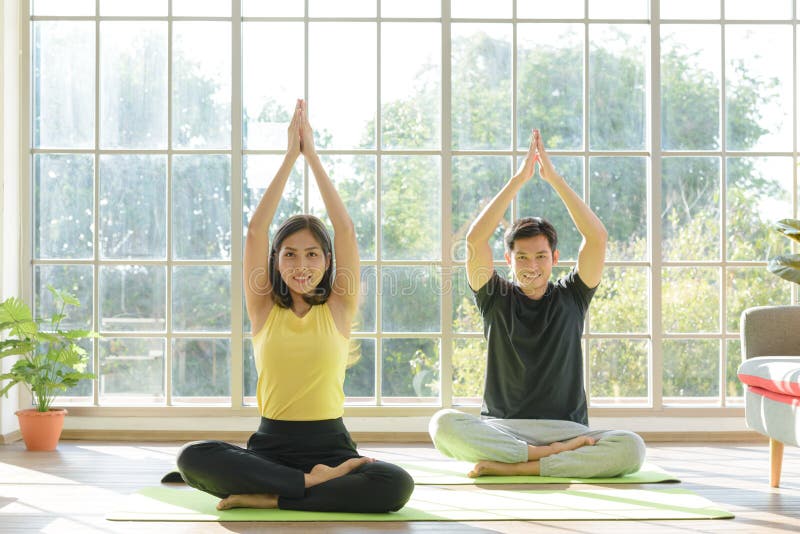 Free Photo  Concept of yoga exercises. young healthy couple in