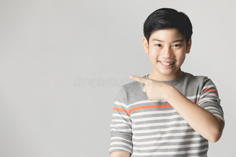 Barely Legal Asian Porn - Young Asian Boy Thinking and Pointing while Smiling with Copy Space Stock  Photo - Image of people, small: 154744610