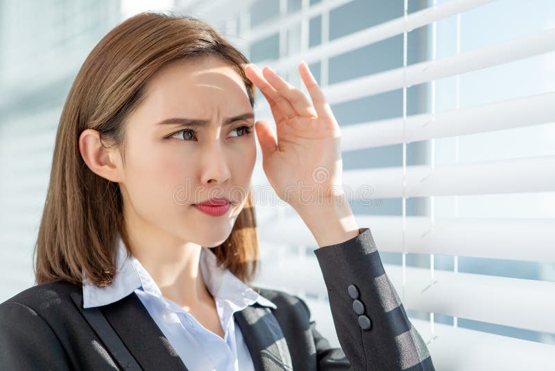 Business woman afraid of suntan stock photography Business woman afraid of suntan stock photography