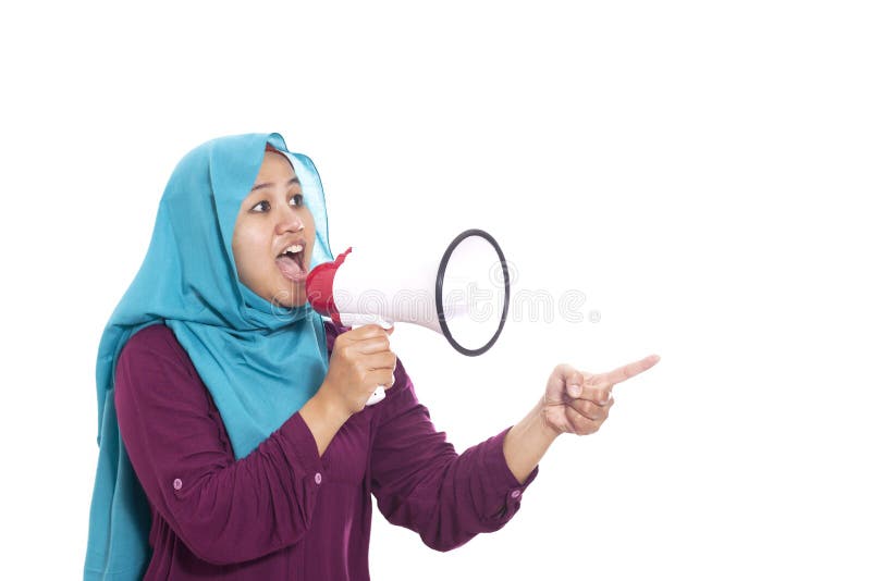 Young Asian businesswoman wearing suit and hijab screaming with an angry expression. Isolated on white. Close up body portrait. Young Asian businesswoman wearing suit and hijab screaming with an angry expression. Isolated on white. Close up body portrait