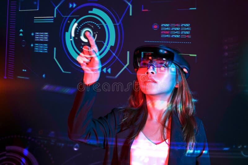 Young asian girl try augmented and virtural reality glasses hololens in the lab room. Mixed reality future technology stock image Young asian girl try augmented and virtural reality glasses hololens in the lab room. Mixed reality future technology stock image