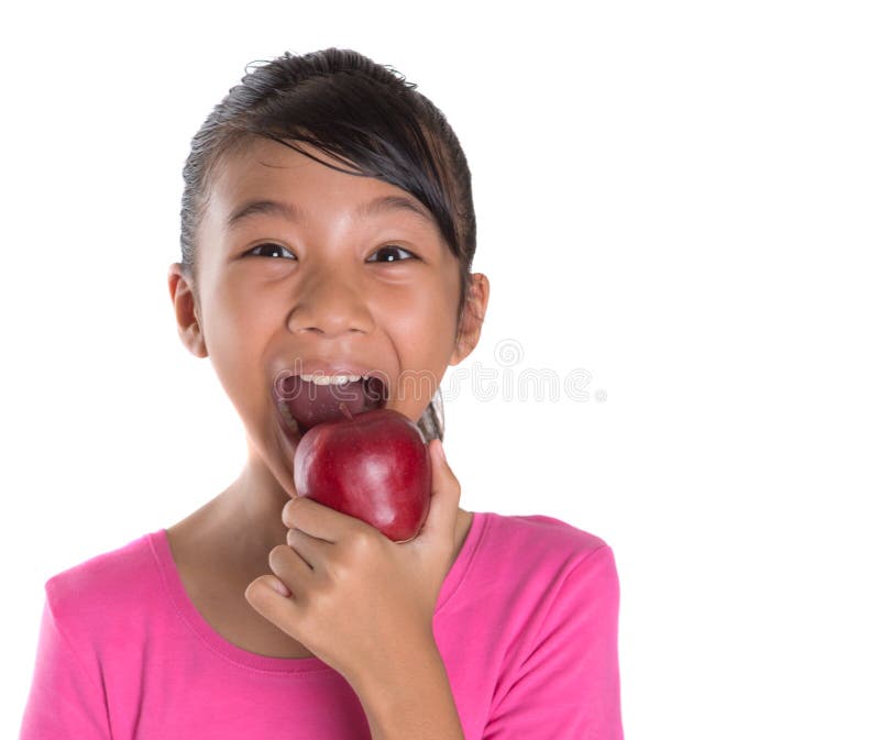 Young Asian Malay Teenager Eating Red Apple III