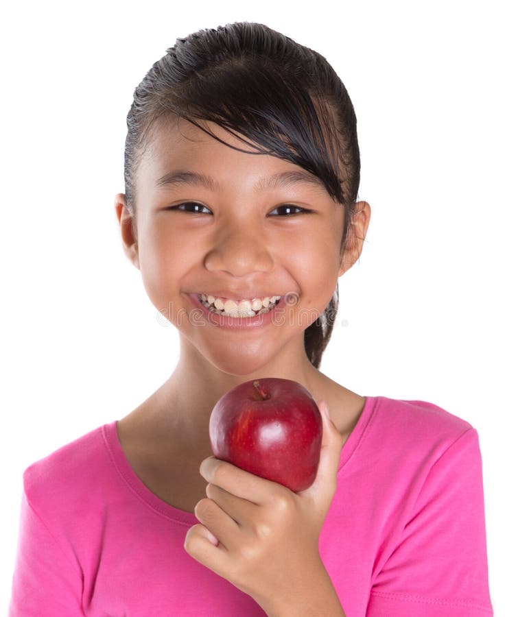 Young Asian Malay Teenager Eating Red Apple VI