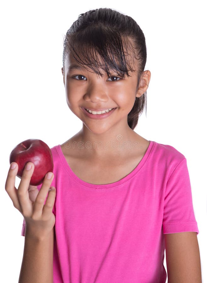 Young Asian Malay Teenager Eating Red Apple VIII