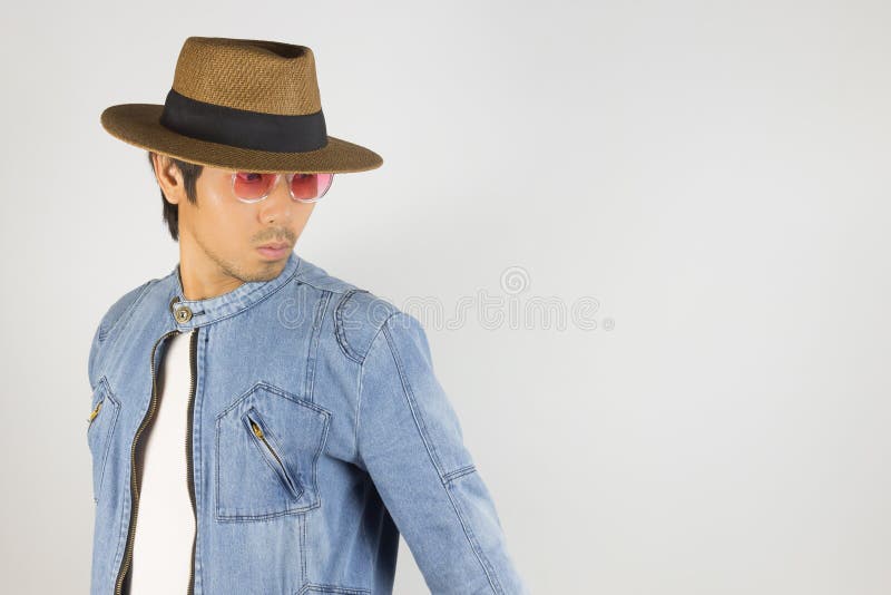 Young Asian Man In Jeans Or Denim Jacket Wear Red Glasses And Hat At Left Frame Stock Image Image Of Posing Korean