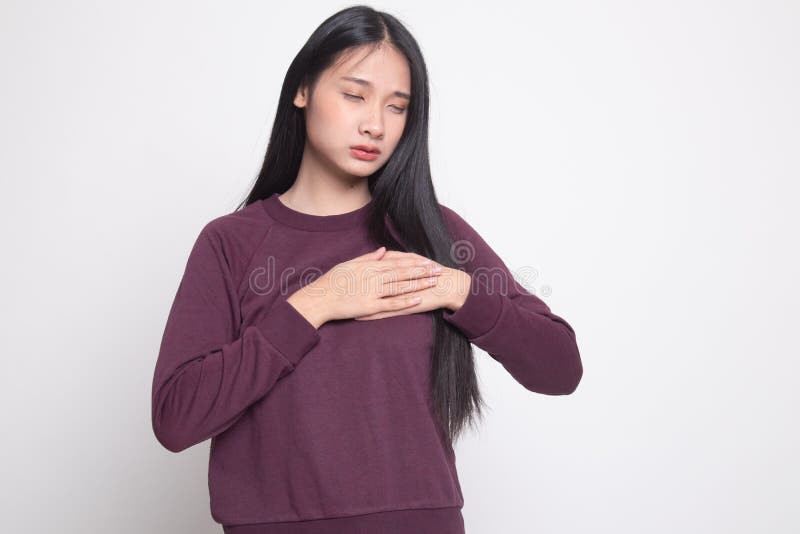 Young Asian woman got chest pain royalty free stock image Young Asian woman got chest pain royalty free stock image