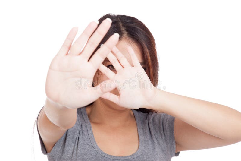 Young Asian woman hide her face with hand stock photo Young Asian woman hide her face with hand stock photo
