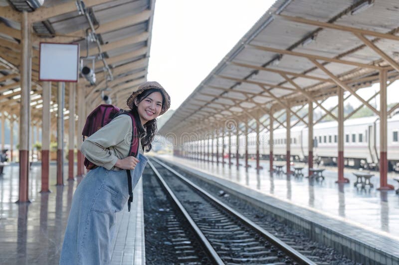 Young Asian Woman in Modern Train Station Female Backpacker Passenger ...