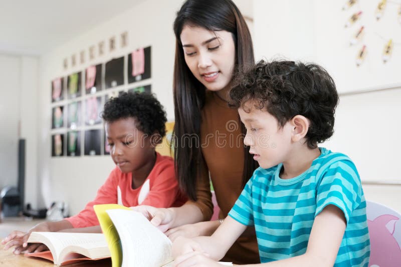 Study with others. Photo of a girl with two daughters. The teacher asked the children
