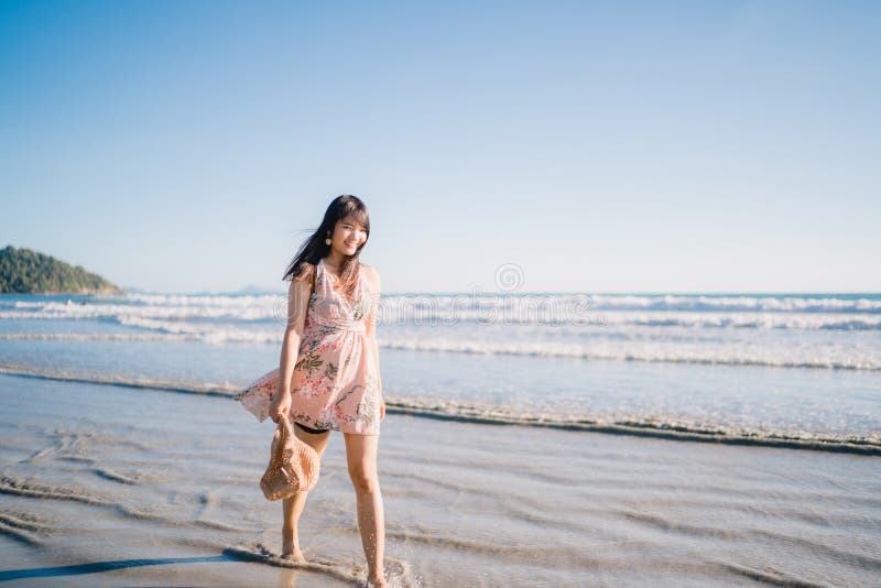 Young Asian Woman Walking On Beach Beautiful Female Happy Relax