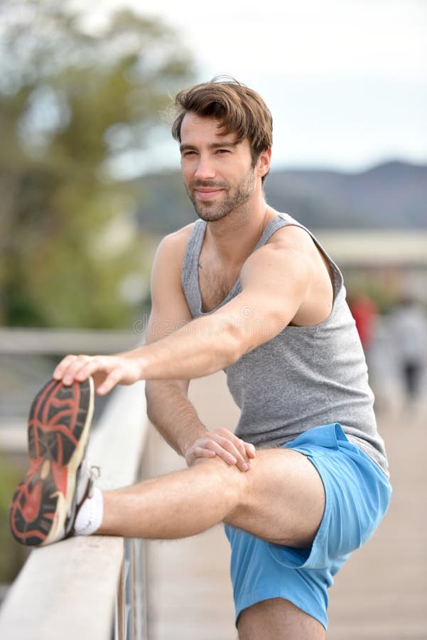 Young Athletic Man Stretching after Jogging Stock Photo Image of