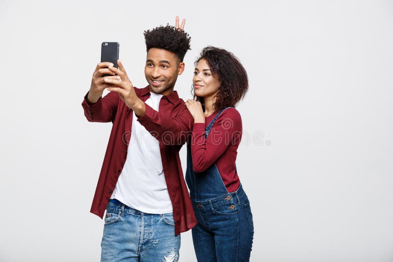 Young, Loving Couple, Happy Young Couple, Pose for Selfie Pose with Smart  Phone, Making Selfie on Camera Stock Photo - Image of male, camera:  154437710