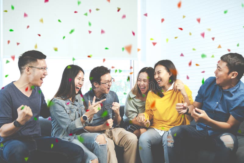 Young Attractive asian group of friends talking and laughing with happy in gathering meeting sitting at home feeling cheerful and royalty free stock images Young Attractive asian group of friends talking and laughing with happy in gathering meeting sitting at home feeling cheerful and royalty free stock images