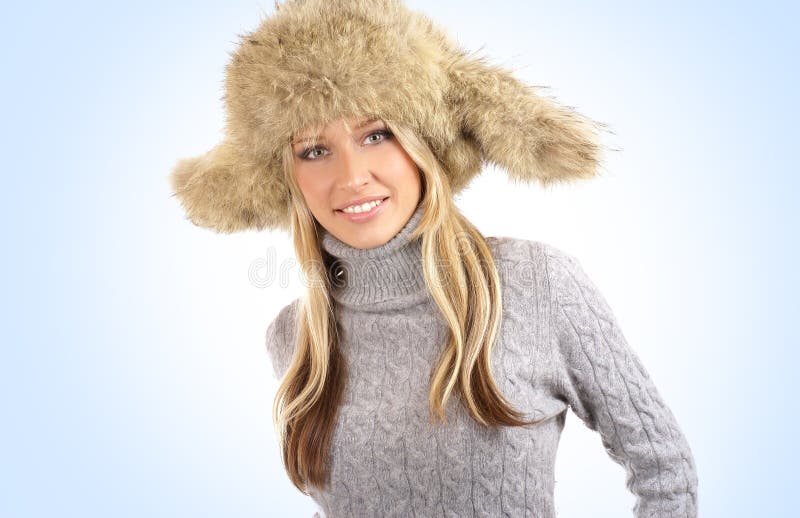 Young and attractive blond wearing a winter hat