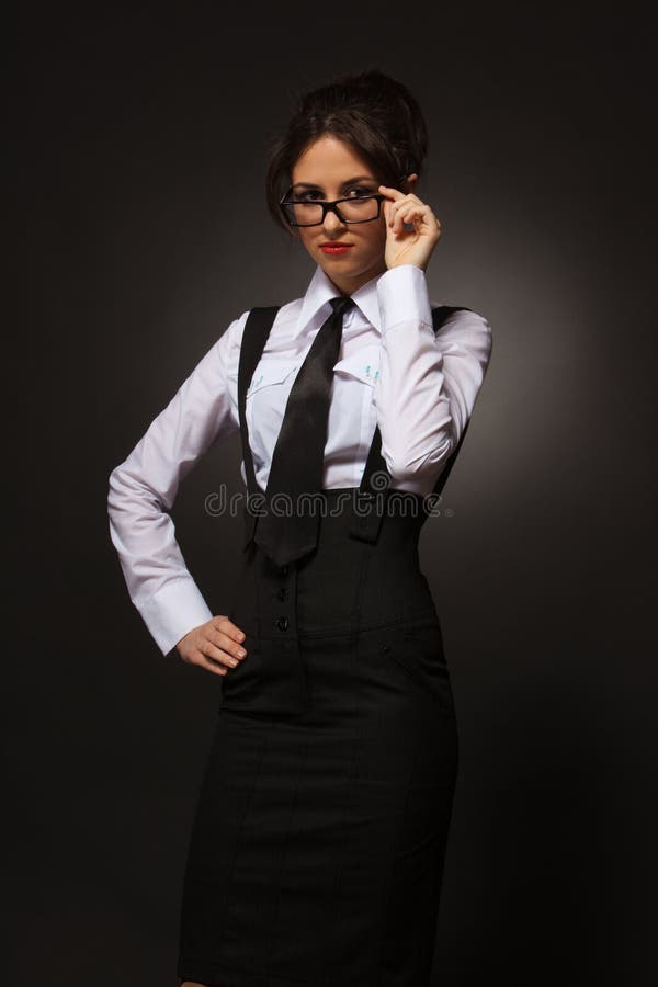 Young attractive business woman in glasses