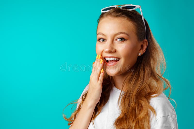 Young attractive cheerful girl laughing with joy stock photography