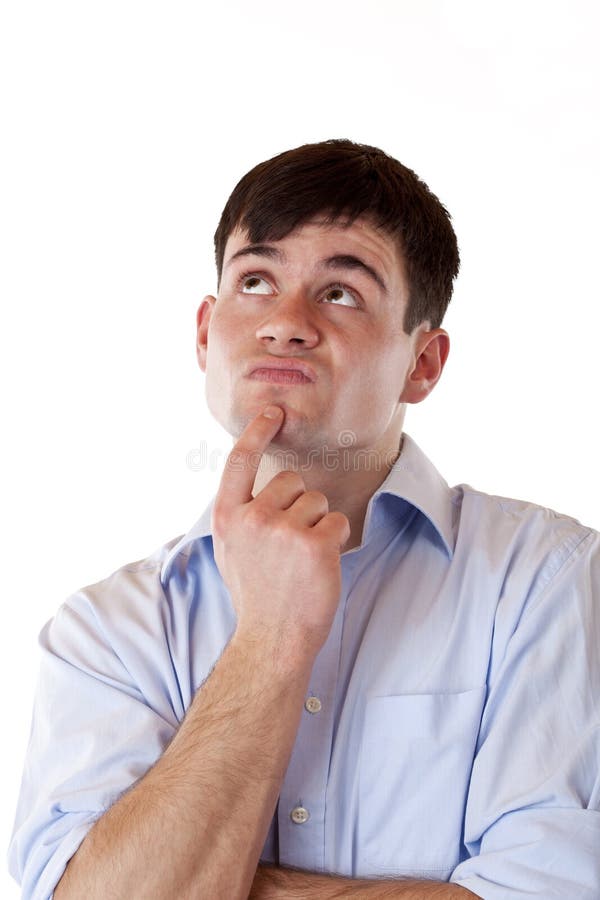 Young attractive contemplative man looks up