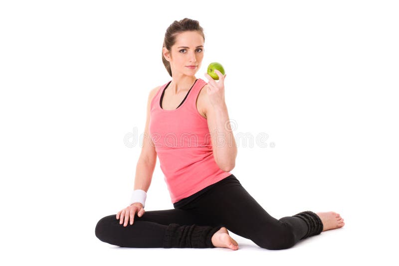 Young attractive female with green apple, isolated