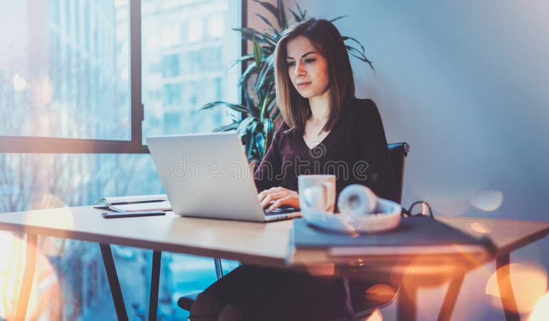 Young Attractive Girl Working on Laptop at Her Workplace at Night  Office.Horizontal.Blurred Background.Flares. Stock Image - Image of  finance, bank: 114219585
