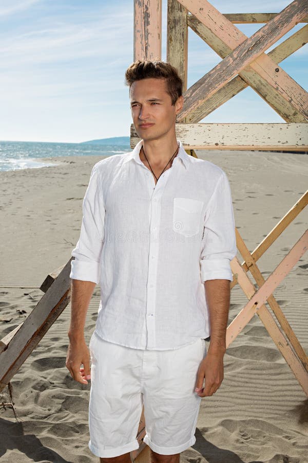 Young Attractive Guy in White Clothes Posing on Stock Photo - Image of ...