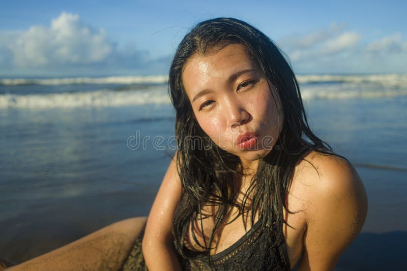 https://thumbs.dreamstime.com/b/young-attractive-happy-asian-japanese-woman-swimsuit-playful-sand-beautiful-beach-paradise-feeling-relaxed-natural-173552399.jpg