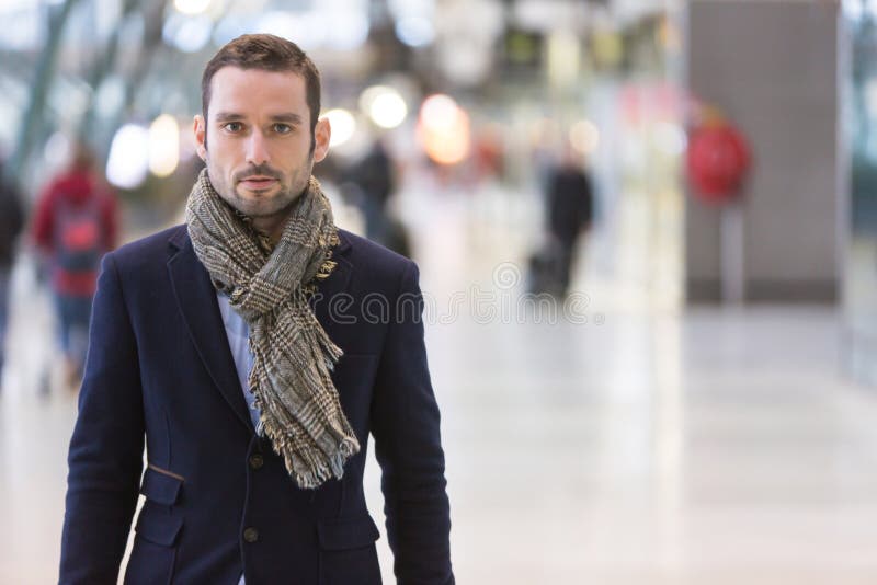 Young attractive man transiting a railway station stock images Young attractive man transiting a railway station stock images