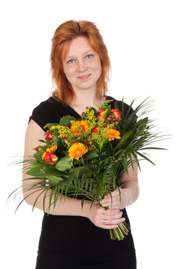 Young attractive woman with a bouquet of flowers