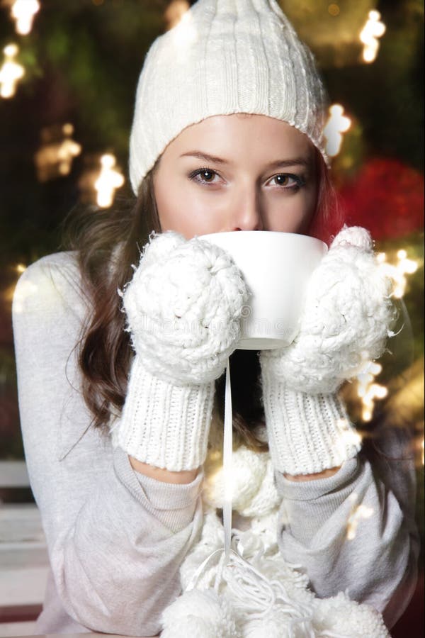 Young attractive woman with cup of coffee