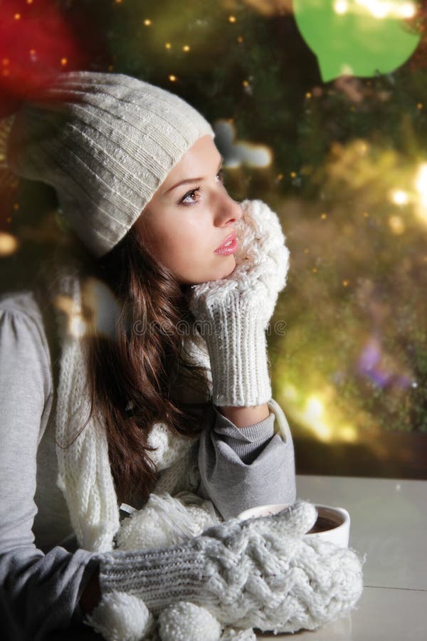 Young attractive woman with cup of coffee