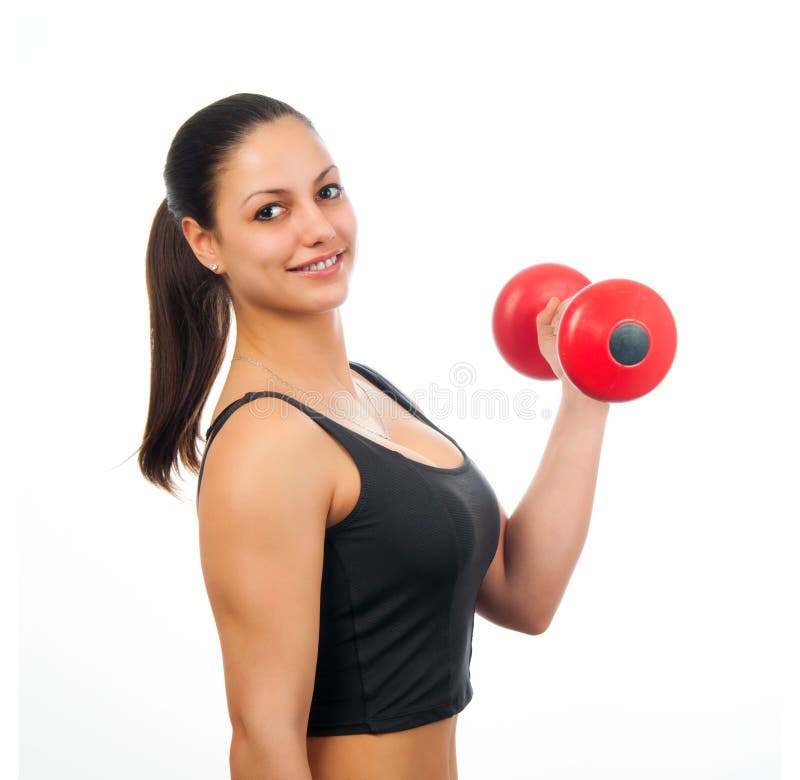 Young attractive woman exercising with dumbbell