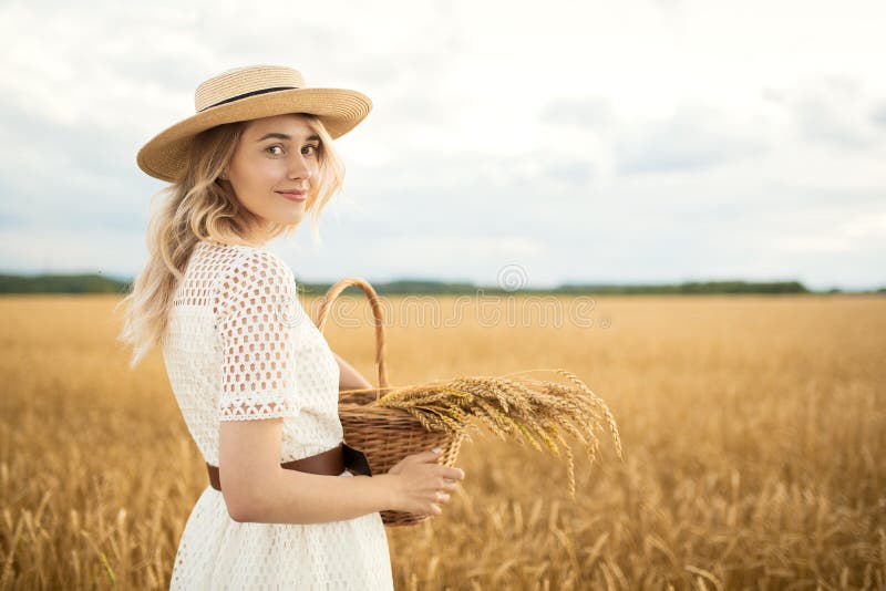 Young Attractive Woman and Golden Wheat Field. Stock Image - Image of ...