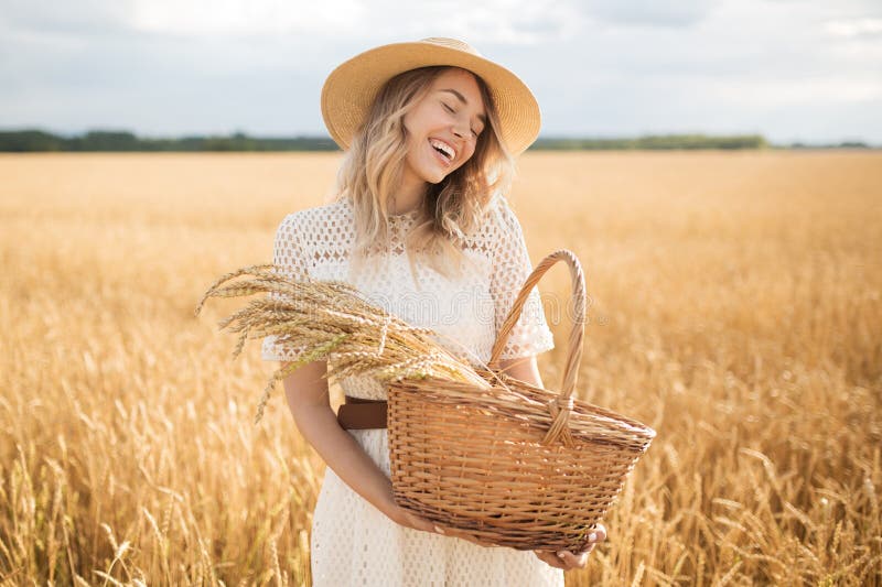 Young Attractive Woman and Golden Wheat Field. Stock Image - Image of ...