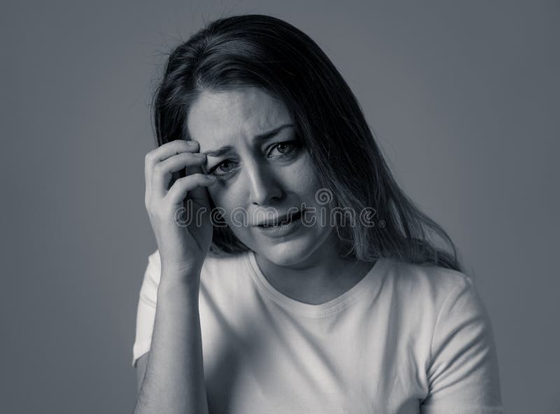 sad woman crying, looking aside on black background, closeup portrait,  profile view, monochrome Stock Photo - Alamy