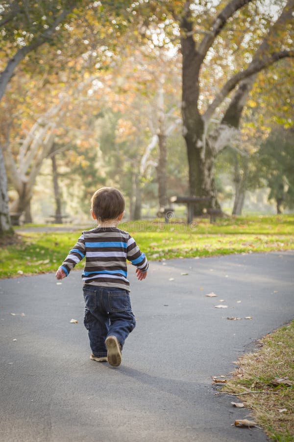 Young Baby Boy Walking in the Park Stock Image Image of young