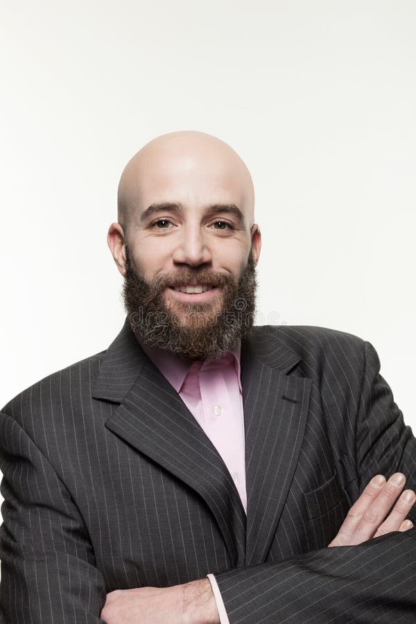 Young bald man with a beard royalty free stock image